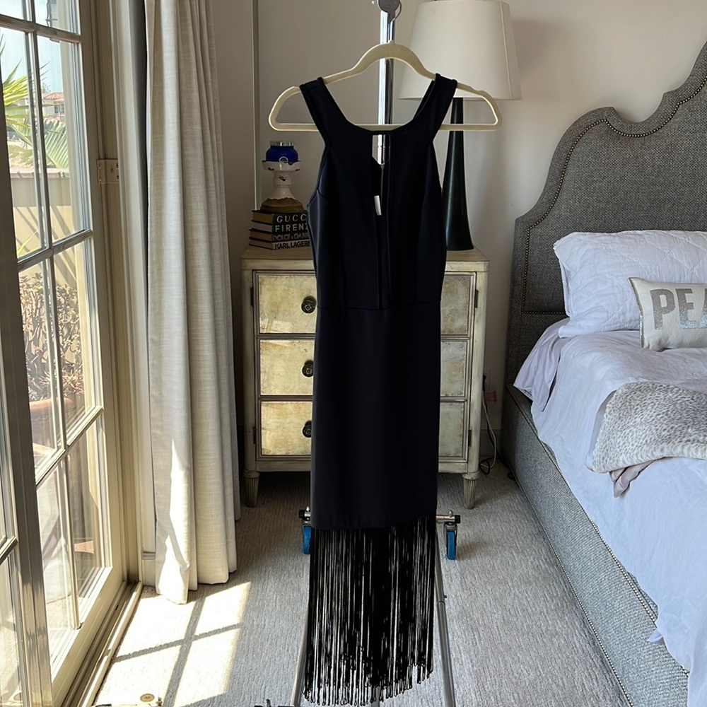 Great for the dance floor!  Black dress for girls night out or date night!